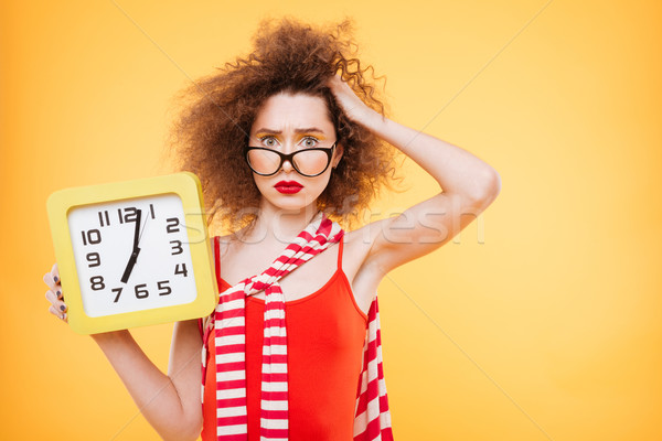 Not understand Bright model with clock Stock photo © deandrobot