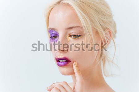 Naked woman with eyes closed Stock photo © deandrobot