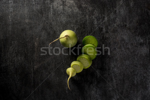 Top view picture of the cut radish Stock photo © deandrobot