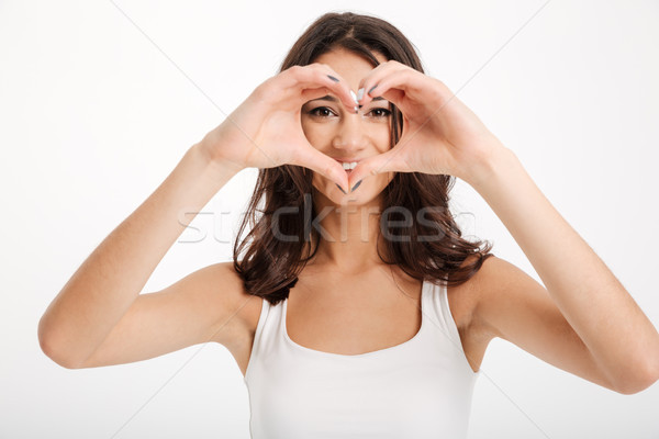 Close up portrait of a happy girl dressed in tank-top Stock photo © deandrobot
