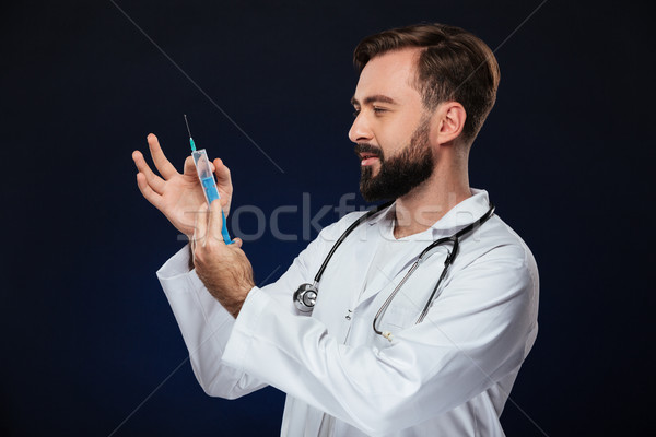 Stock photo: Portrait of a handsome male doctor dressed in uniform