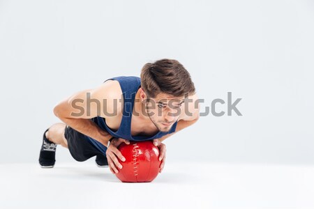 Portrait of a concentrated young half naked sportsman Stock photo © deandrobot