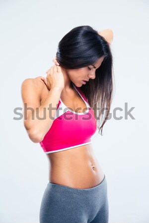 Deportes mujer dolor de cuello gris mujeres fitness Foto stock © deandrobot