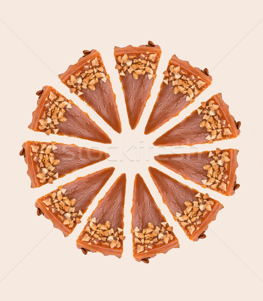 Caramel pancakes in circle over white Stock photo © deandrobot