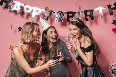 Portrait of a happy joyful multiracial group of friends Stock photo © deandrobot