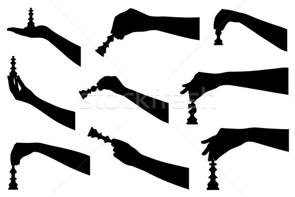 Set of hands holding chess pieces  Stock photo © DeCe