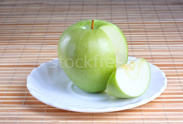 Apple on the plate Stock photo © DedMorozz