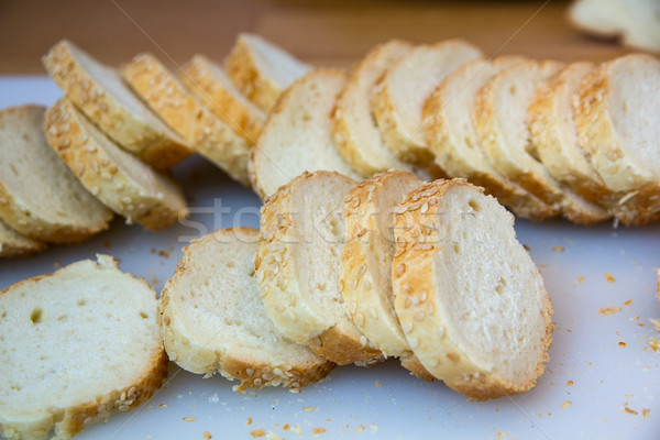 Sliced peaces of French baguette Stock photo © DedMorozz