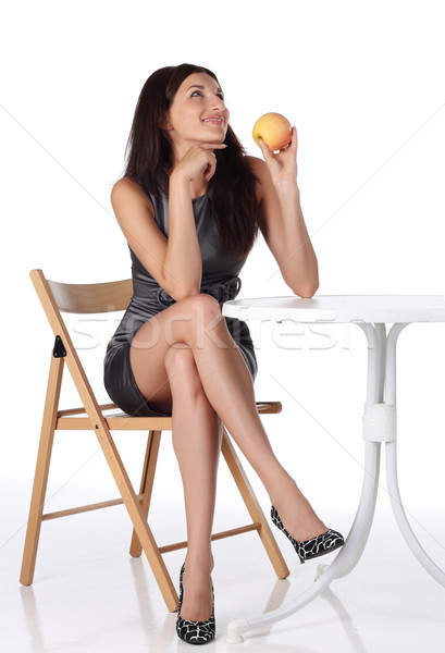 Kız elma oturma sandalye yüz moda Stok fotoğraf © DedMorozz