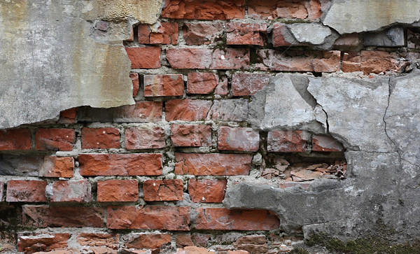 Spart perete cărămizi vechi întuneric Imagine de stoc © DedMorozz