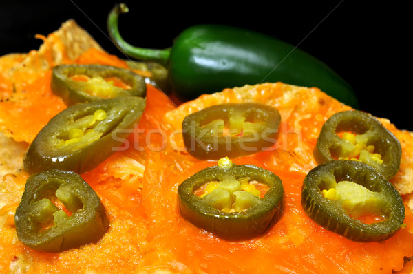 Nachos jalapeno paprikák közelkép bors szeletek Stock fotó © dehooks