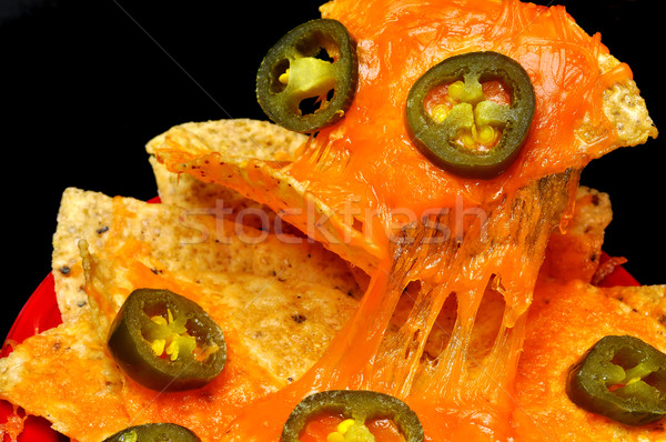 Nachos jalapeno paprikák közelkép bors szeletek Stock fotó © dehooks