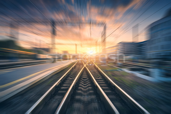 Railway station with motion blur effect. Blurred railroad Stock photo © denbelitsky