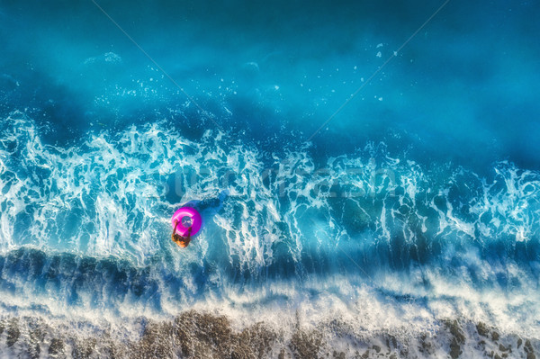 Aerial view of woman swimming in the sea Stock photo © denbelitsky