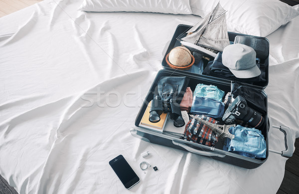 open travel case in hotel bedroom travel vacation concept background Stock photo © denisgo