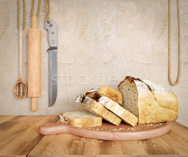 Fresh bread with oat sliced on a slate cutting board photo background copy space Stock photo © denisgo