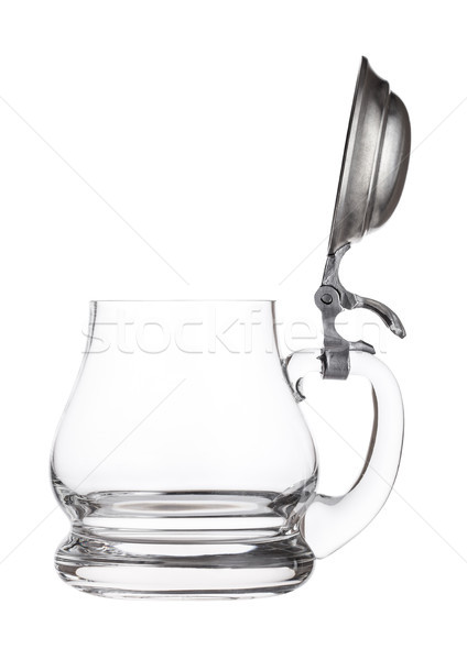 Empty vintage retro beer glass. Glass handle with silver steel top. Stock photo © DenisMArt