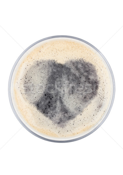 Glass of stout beer top with heart shape Stock photo © DenisMArt