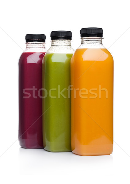 Stock photo: Bottles of healthy fruit juice smoothie