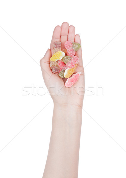 Female hand hold gummy color candies with sugar Stock photo © DenisMArt