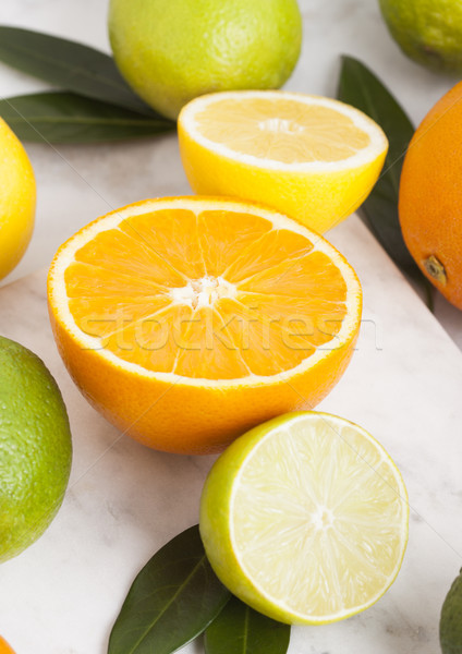 Fraîches organique brut oranges citrons marbre [[stock_photo]] © DenisMArt