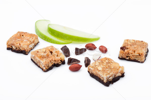 Cereal bar bits apple chocolate and peanuts Stock photo © DenisMArt