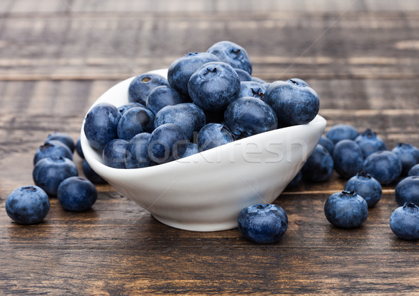 Fresh healthy organic blueberry in white bowl Stock photo © DenisMArt