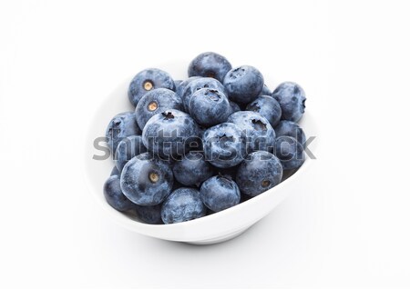 Fresh healthy organic blueberry in white bowl Stock photo © DenisMArt