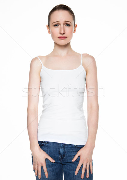 Young woman sad and crying having problem on white Stock photo © DenisMArt