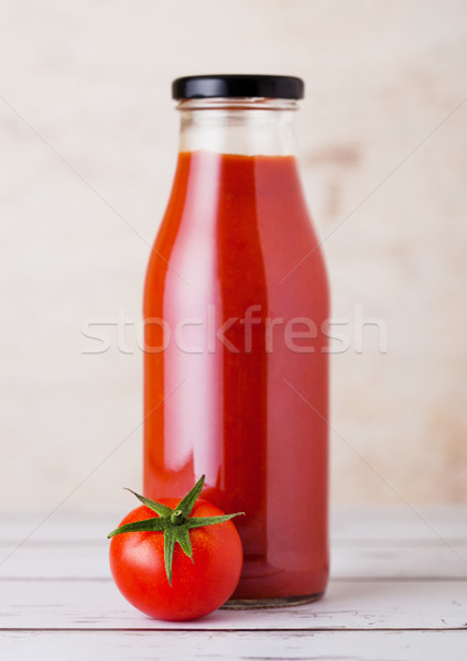 Vetro bottiglia pomodoro greggio fresche Foto d'archivio © DenisMArt
