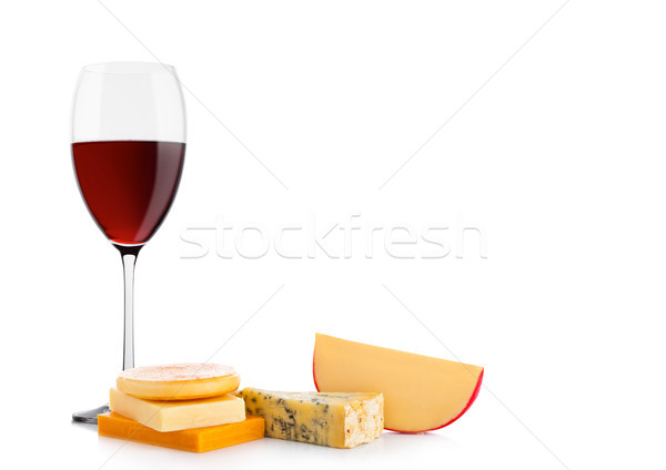 Glass of red wine with cheese selection and grapes Stock photo © DenisMArt