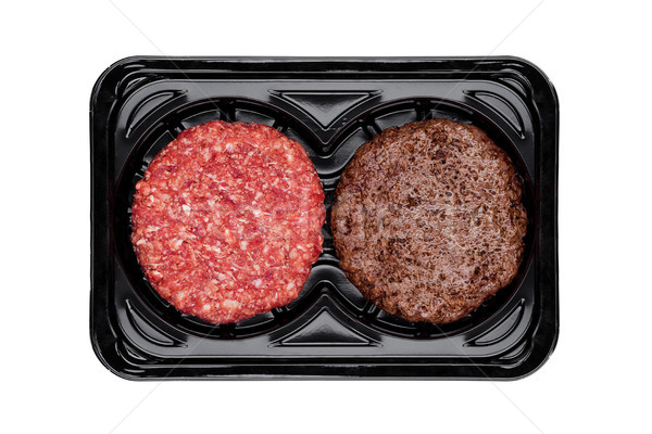 Stock photo: Raw and fried fresh beef burgers in plastic tray 