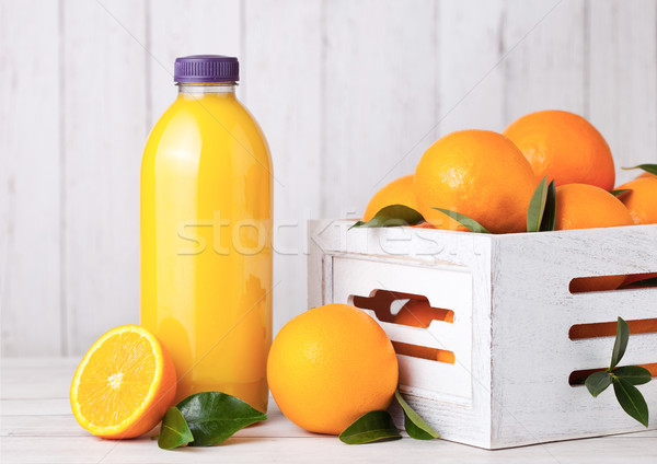 Plastic bottle of raw organic fresh orange juice Stock photo © DenisMArt