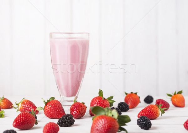 Stock photo: Milkshake glass with fresh summer berries smoothie