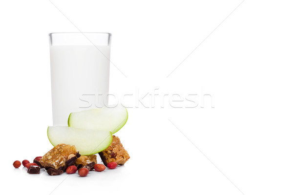 Cereal bar bits apple chocolate and glass of milk Stock photo © DenisMArt
