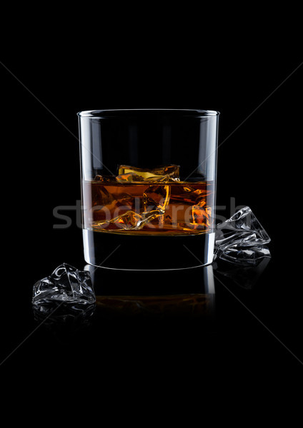 Elegáns üveg whiskey jégkockák fekete tükröződés Stock fotó © DenisMArt