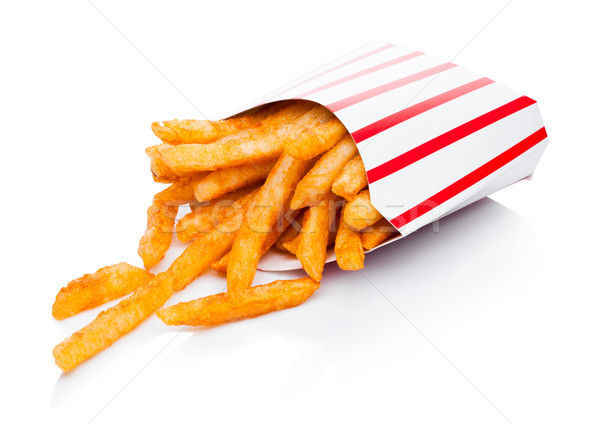 Southern french fries in paper container on white Stock photo © DenisMArt