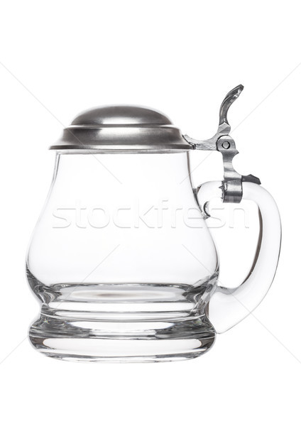 Empty vintage retro beer glass. Glass handle with silver steel top. Stock photo © DenisMArt