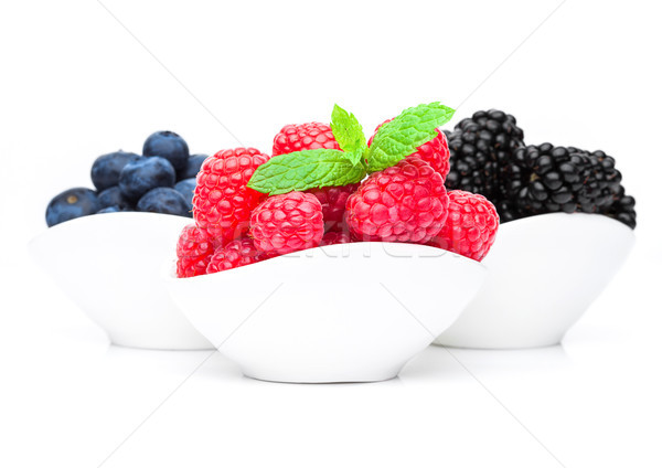 Fresh blueberry raspberry and blackberry in bowl Stock photo © DenisMArt