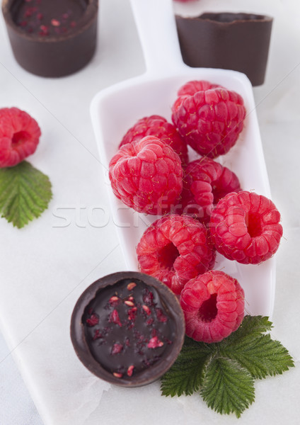 Scoop with fresh raspberries and luxury chocolate Stock photo © DenisMArt