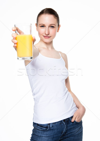 Gyönyörű nő tart üveg narancslé fehér felső Stock fotó © DenisMArt