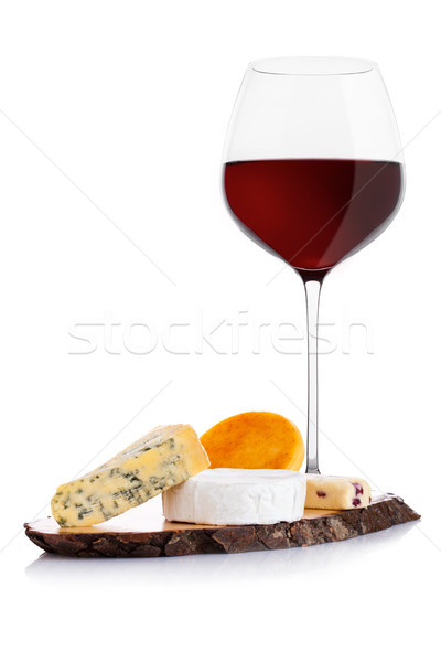 Glass of red wine with cheese selection and grapes Stock photo © DenisMArt