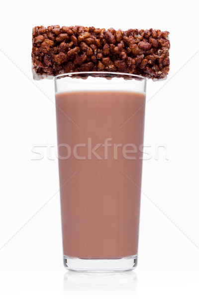 Glass of chocolate breakfast milk with choc cereal Stock photo © DenisMArt