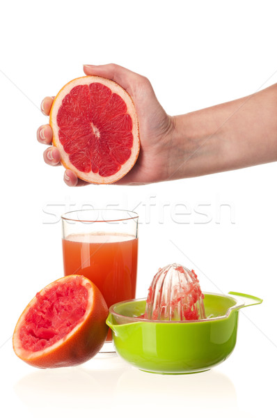 Grapefruit Saft Glas frischen Hand Hälfte Stock foto © DenisNata
