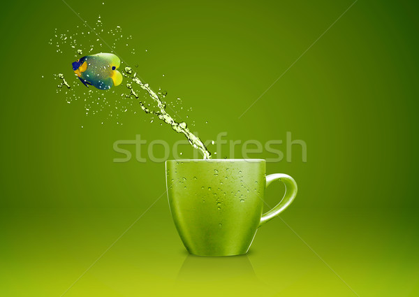 Cool Fisch springen heraus Tasse Wasser Stock foto © designsstock