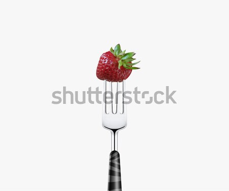 Strawberry pierced by fork,  isolated on white background  Stock photo © designsstock