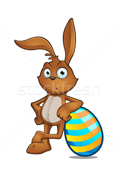 Easter Rabbit Leaning On Large Easter Egg Stock photo © DesignWolf
