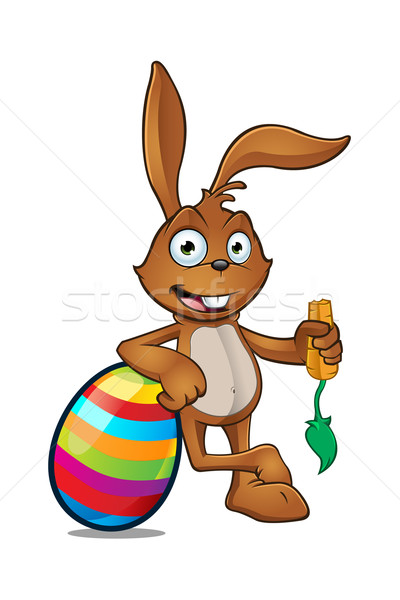 Easter Rabbit Leaning On Large Easter Egg Stock photo © DesignWolf