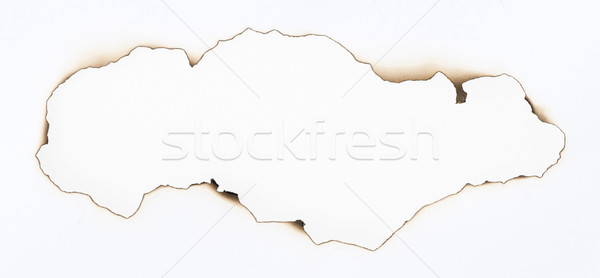 Burned paper and hole Stock photo © deyangeorgiev