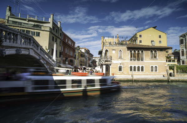 Ancient buildings and boats in the channel in Venice Stock photo © deyangeorgiev